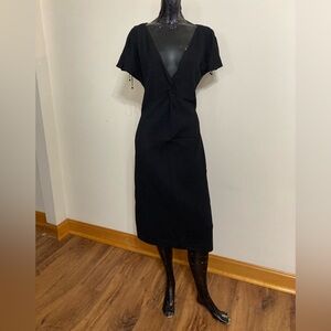 St. John Black Midi Dress with Plunging V-Neck
Item# TSd10